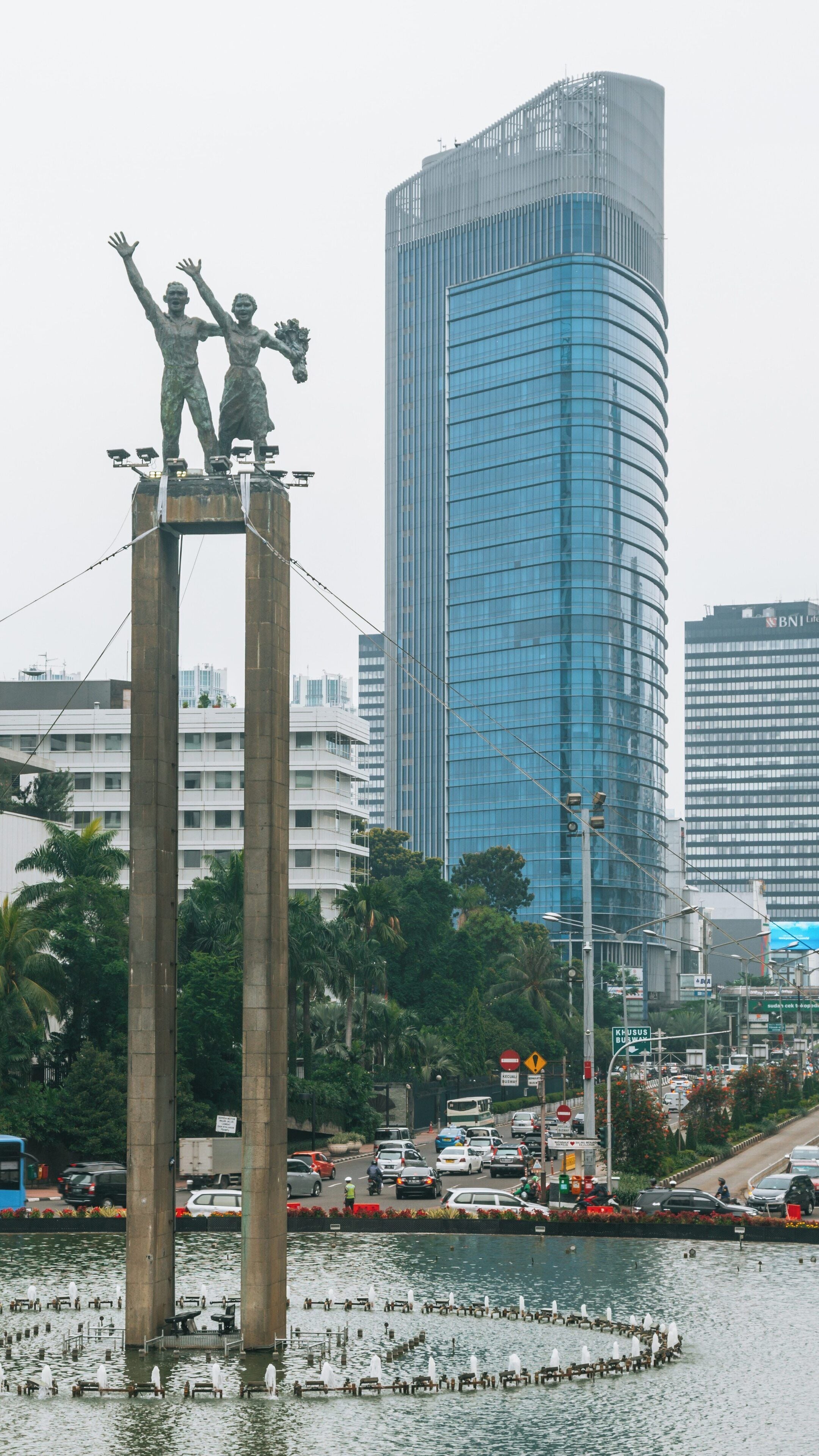 Bundaran HI in Central Jakarta showcases vibrant city life and modern architecture amidst historical landmarks