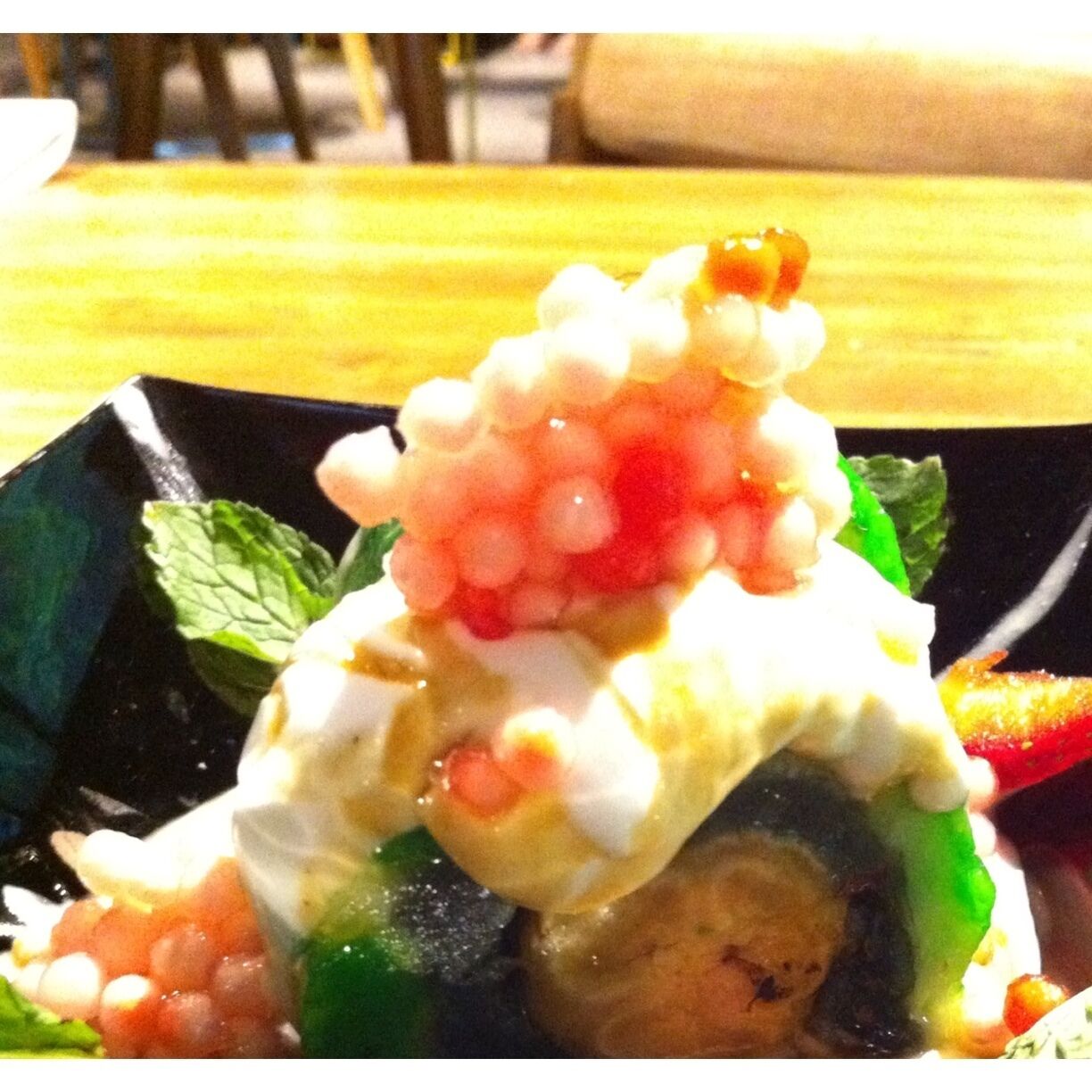 Sushi sticky rice for dessert, filled with banana, palm seed and sugar, and 'sago'. Colorful & delicious!