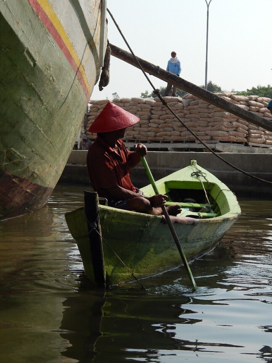 Seen at Sunda Kelapa, a port and old harbor in Jakarta. You can take a little boat across the river to a great little fishing market community. Super friendly locals, and everyone wanted their photo taken. I believe we paid 2,500 rupiah, so around 20 cents to enter the port. 