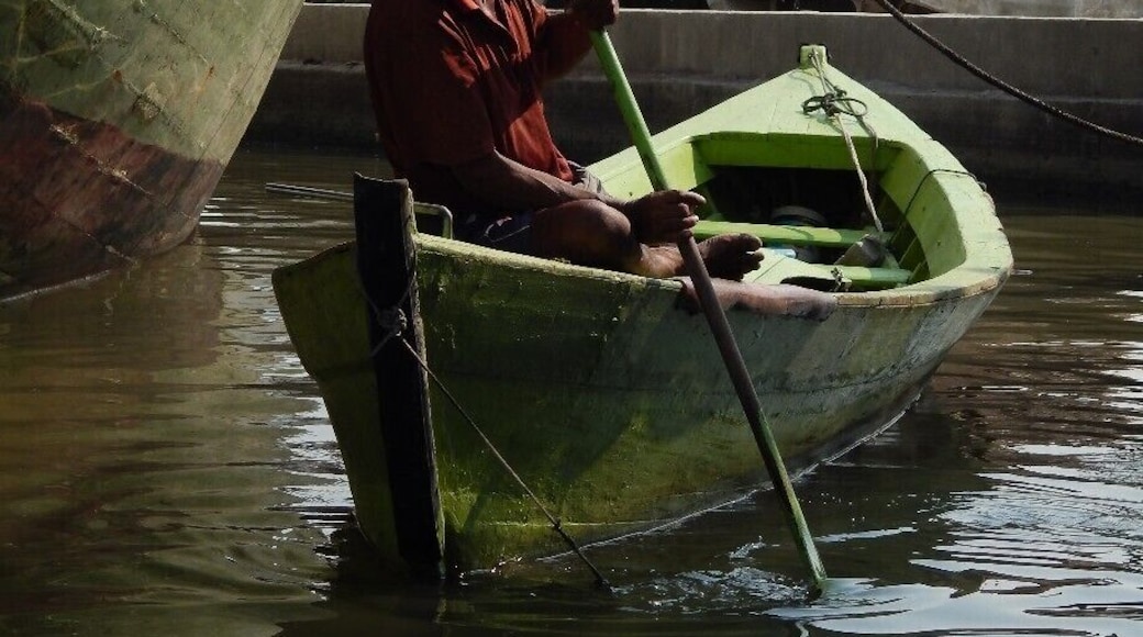 Seen at Sunda Kelapa, a port and old harbor in Jakarta. You can take a little boat across the river to a great little fishing market community. Super friendly locals, and everyone wanted their photo taken. I believe we paid 2,500 rupiah, so around 20 cents to enter the port.