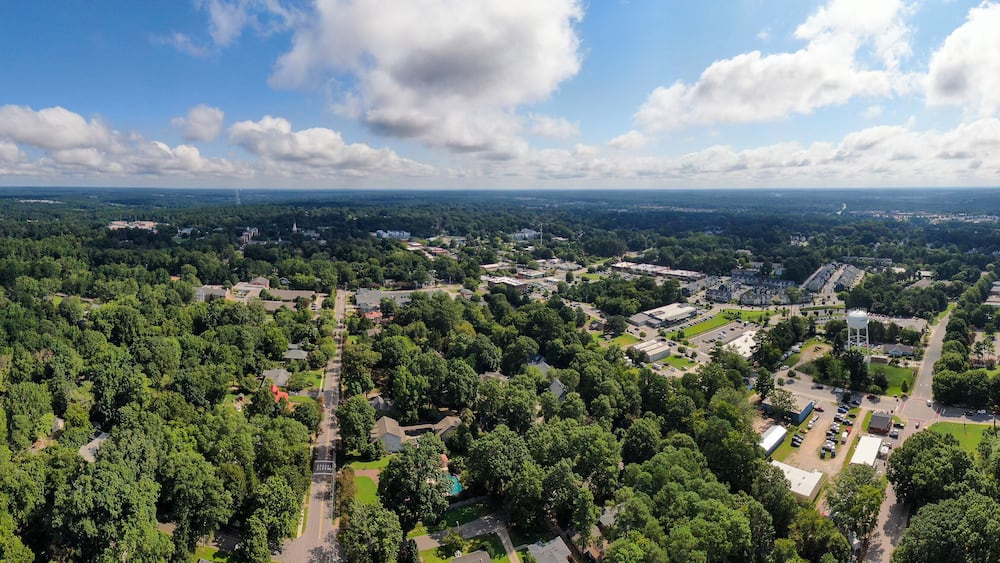 Wide Angle Panoramic Sunny Daytime Drone Image of Wake Forest, North Carolina, USA Featuring the Downtown Historic District, Businesses, and Residential Developments: Tourism, Real Estate, Travel