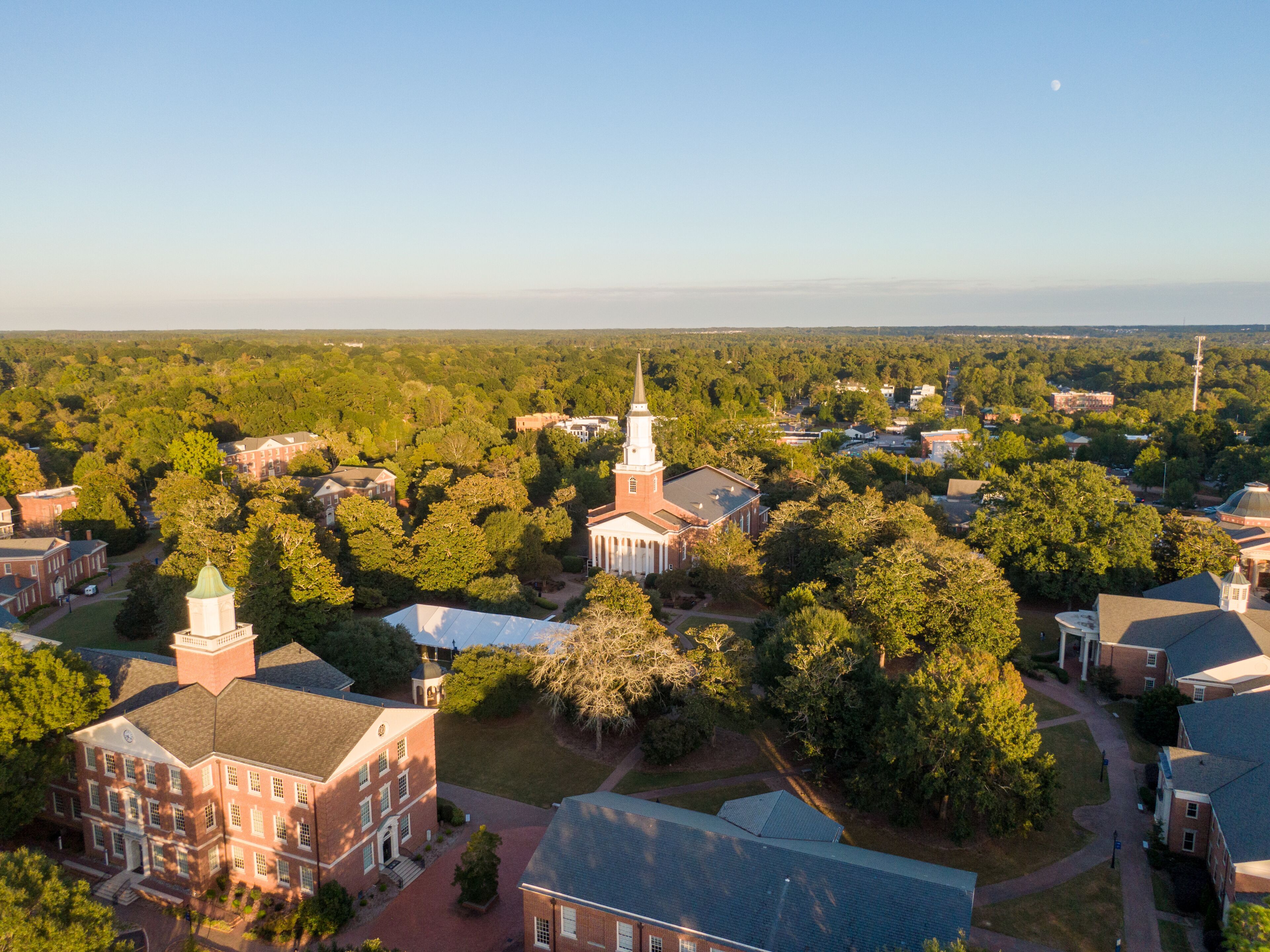 Sunset Drone Images and 4K Video of Downtown Wake Forest North Carolina, Including the Historic District and The Southeastern Baptist Seminary.