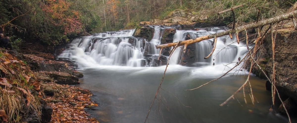 The amazing Chauga Narrows of South Carolina.  The normally calm Chauga River goes crazy for about 200ft turning into a class 6 rapid that is loud and wild.  This small waterfall marks the start of the narrows with the crazy part starting just behind frame.  For a video guide of this destination (along with some epic drone video), please check out https://www.hdcarolina.com/episode/chauga-narrows
#Waterfall