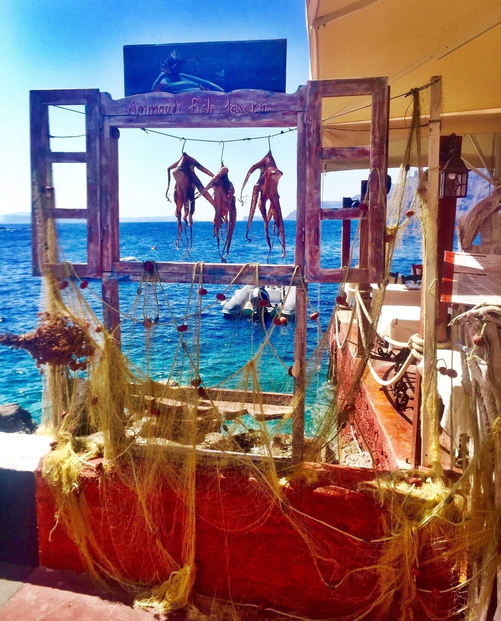 Ammoudi Fish Tavern down in the Bay on Mykonos Island. Freshest  seafood meals with beautiful views. #Greece #Seafood #lifeatexpedia