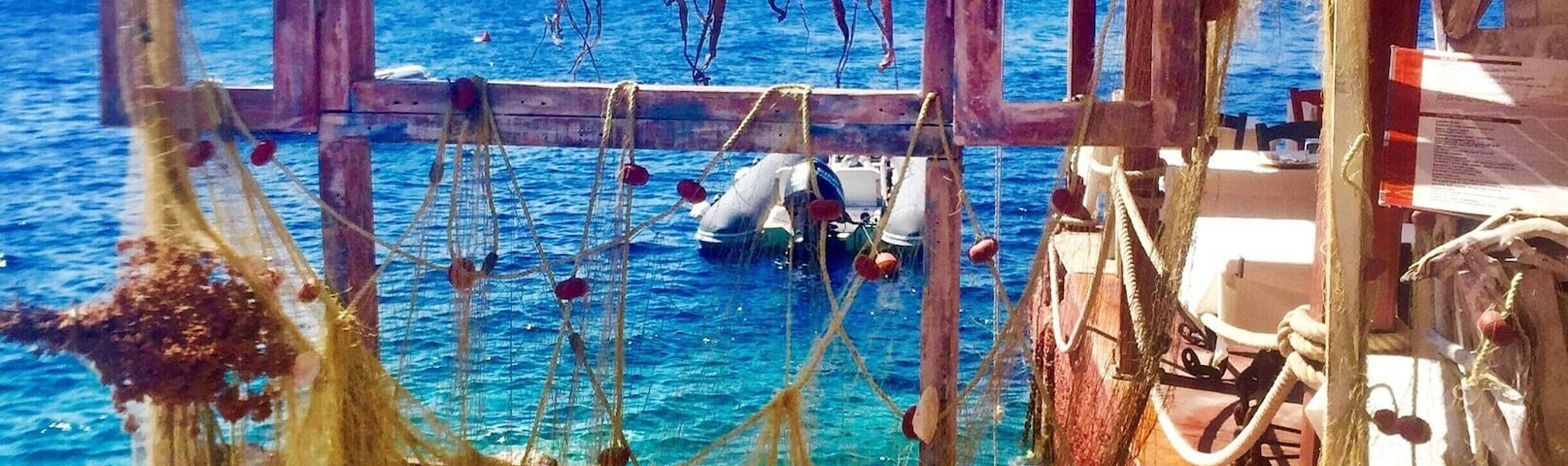 Ammoudi Fish Tavern down in the Bay on Mykonos Island. Freshest seafood meals with beautiful views. #Greece #Seafood #lifeatexpedia