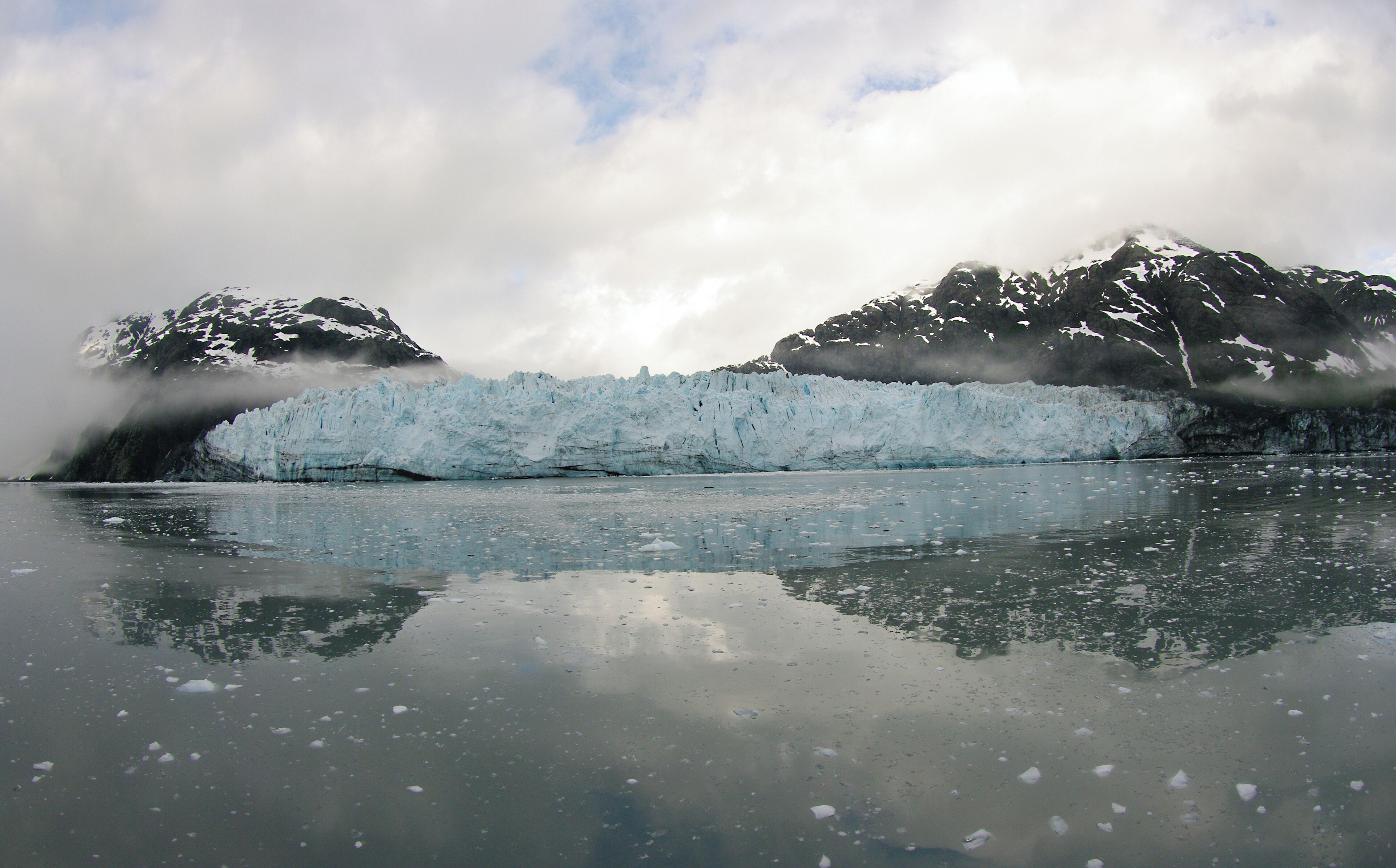I would recommend a small ship cruise like we took in Alaska.  Our cabin door opened on to the outside deck.  The deck railing was 15-20 feet above the water. We woke up one morning and stepped on to deck to the view of this iceberg. #OnTheRoad