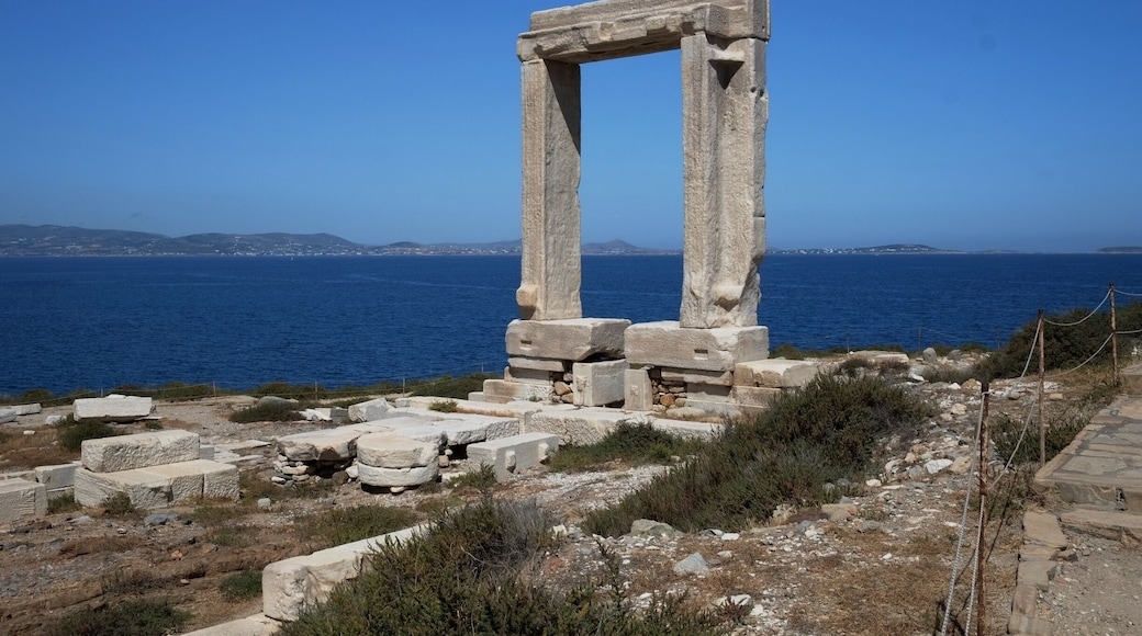 The Portara stands on Palatia, which was once a hill but is now a separate little island connected to Naxos by a causeway.
The Portara is the entrance to an unfinished temple that faces directly toward Delos, Apollo's birthplace. For this reason most scholars believe it was dedicated to Apollo, but some think it was built in honor of Dionysus, who was worshipped on Naxos Island.