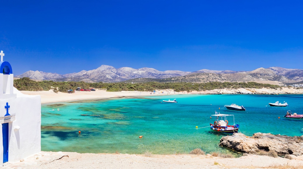Traditional Greece - small church on the turquoise beach. Naxos island