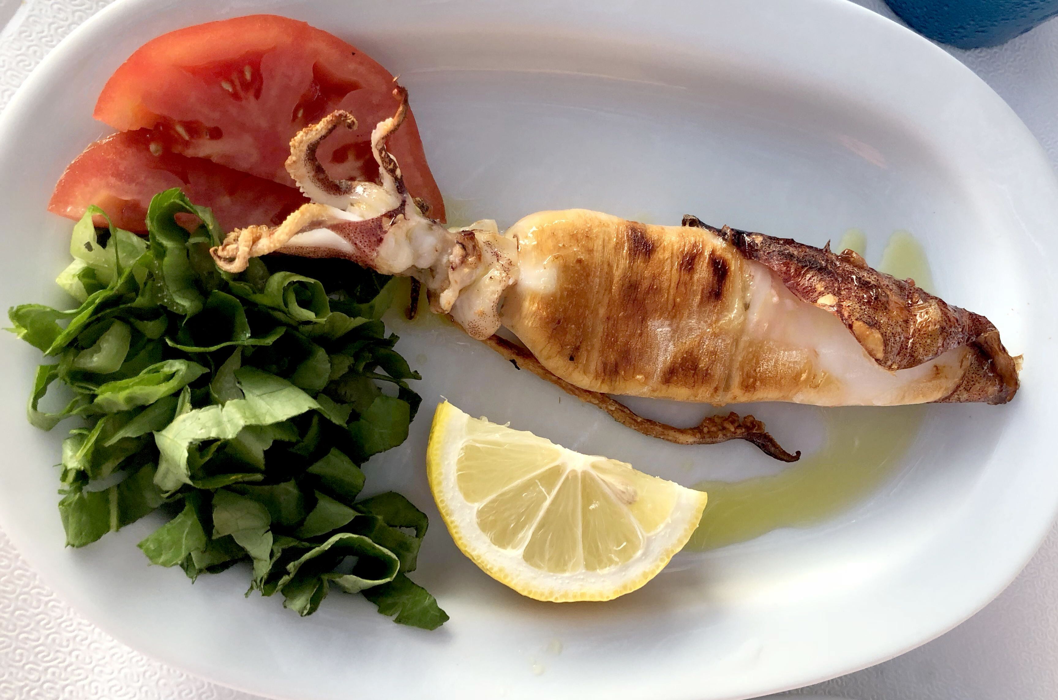 There is nothing better than fresh grilled calamari which done so well at Kozi's at Naxos,  Kozi's is a family restaurant that is right on the sea and the prices are the best! Greece. #GoodEats