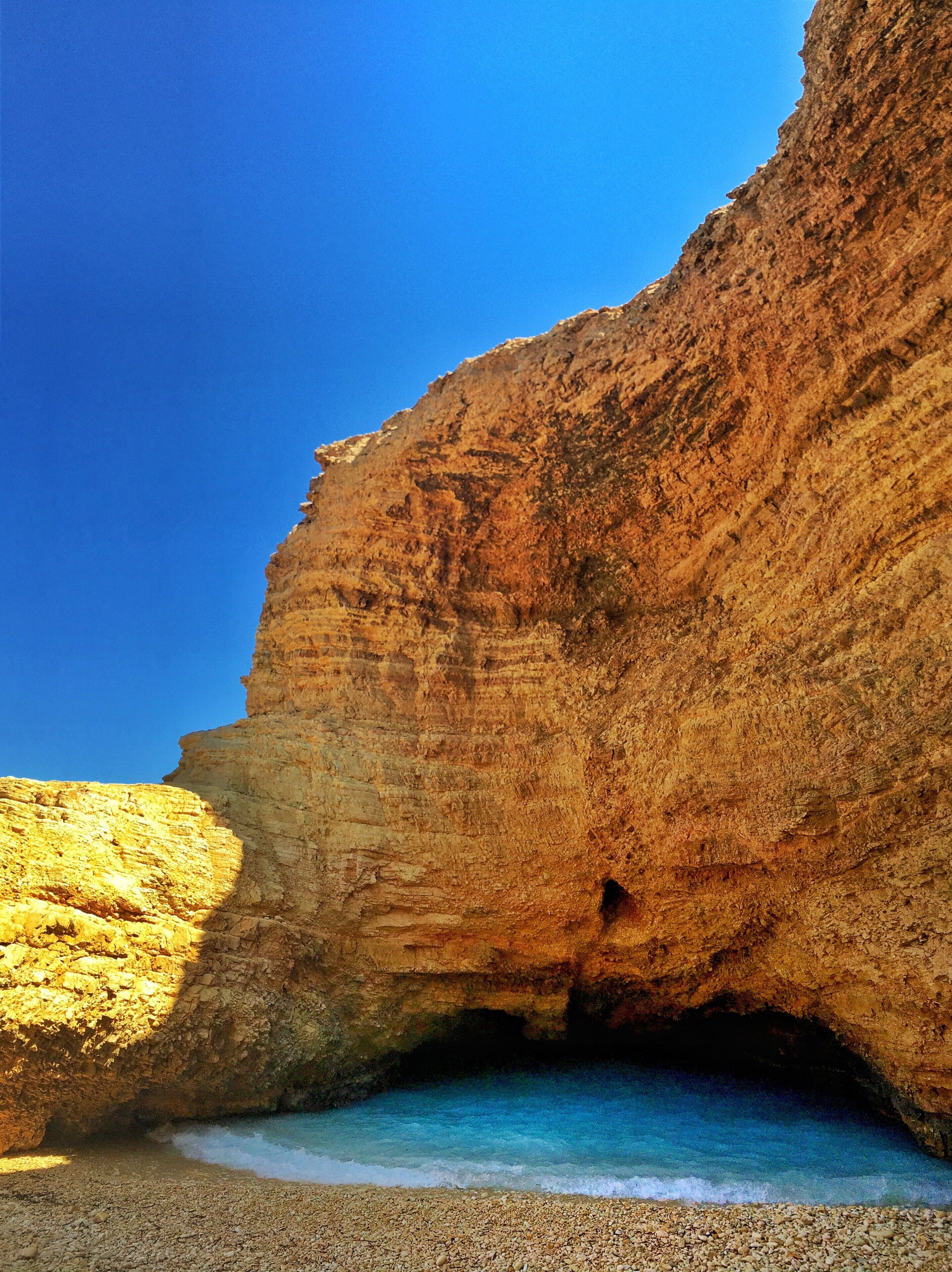 #LifeAtExpedia

You can find this unique spot on the left hand side of the #natural swimming pools, if you follow the path towards east. Climb down for a lovely swim inside the cave and if the sea is calm, you can swim through the narrow passage to the open sea and back.