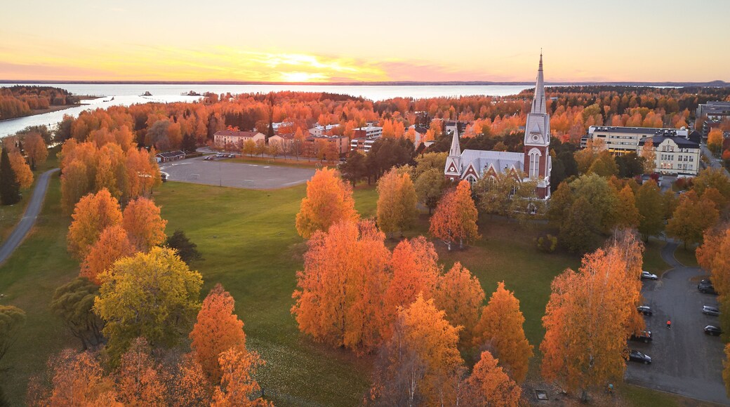 Aerial view of Joensuu Church. Autumn cityscape at sunset.