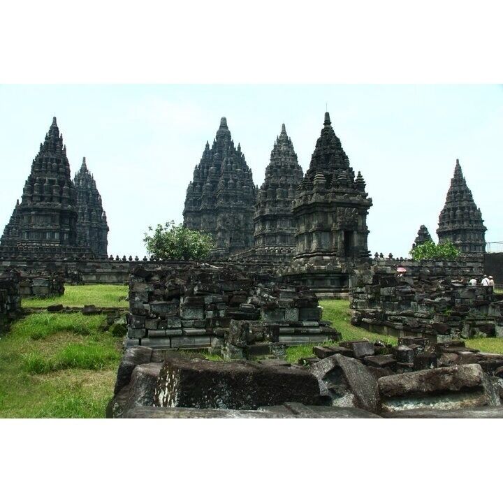 Ancient stone structures with multiple pointed towers.