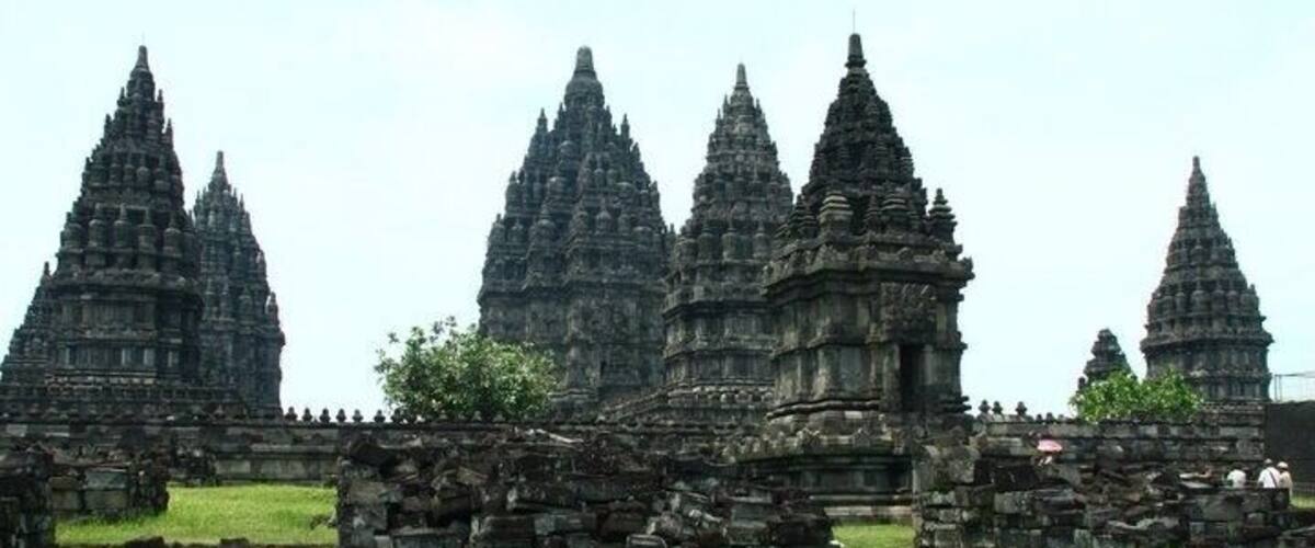 Ancient stone structures with multiple pointed towers.