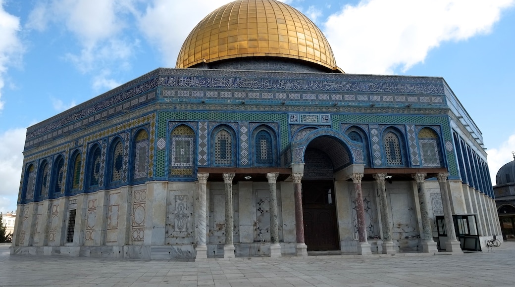Located on Temple Mount is the Dome of the Rock, one of the most recognizable structures in Jerusalem.
Temple Mount is a large platform constructed on top of one of the hills in the old city of Jerusalem. It is the holiest site in the world in Judaism, the third holiest site in the world in Islam after Mecca and Medina, and an important site for Christians.
For Jewish people, Temple Mount is also called Mount Moriah. It is here that the first two Temples were built and this is the location for the Holy of Holies. To avoid walking on the Holy of Holies, many Jewish people will not walk on Temple Mount, since the exact location of the Holy of Holies is not known.
For Muslims, The Dome of Rock also known as Qubbat as-Sakhra. is an Islamic shrine located on Temple Mount in the Old City of Jerusalem, it is the 3rd holiest site in the world in Islam. The Dome of the Rock is a shrine that contains the Foundation Stone and marks the spot where Muhammad ascended into heaven. Muslims once faced this place to pray, until Muhammad changed the direction of prayers to Mecca after a revelation from Allah.
Since the Crusades, Temple Mount has been managed by the Muslim Waqf. The Waqf security guards are Palestinians who get paid by the country of Jordan. Since Temple Mount is located in the old city of Jerusalem, both Israel and Palestine lay claim to it, which is still a major issue in the Arab-Israeli conflict.
Until the mid-twentieth century, non-Muslims were not permitted on Temple Mount. Since 1967, non-Muslims have been permitted to enter the site but prayer is forbidden.
Since the Crusades, Temple Mount has been managed by the Muslim Waqf. The Waqf security guards are Palestinians who get paid by the country of Jordan. Since Temple Mount is located in the old city of Jerusalem, both Israel and Palestine lay claim to it, which is still a major issue in the Arab-Israeli conflict.
Until the mid-twentieth century, non-Muslims were not permitted on Temple Mount. Since 1967, non-Muslims have been permitted to enter the site but prayer is forbidden.
Since the Crusades, Temple Mount has been managed by the Muslim Waqf. The Waqf security guards are Palestinians who get paid by the country of Jordan. Since Temple Mount is located in the old city of Jerusalem, both Israel and Palestine lay claim to it, which is still a major issue in the Arab-Israeli conflict.
Until the mid-twentieth century, non-Muslims were not permitted on Temple Mount. Since 1967, non-Muslims have been permitted to enter the site but prayer is forbidden.
Since the Crusades, Temple Mount has been managed by the Muslim Waqf. The Waqf security guards are Palestinians who get paid by the country of Jordan. Since Temple Mount is located in the old city of Jerusalem, both Israel and Palestine lay claim to it, which is still a major issue in the Arab-Israeli conflict.
Until the mid-twentieth century, non-Muslims were not permitted on Temple Mount. Since 1967, non-Muslims have been permitted to enter the site but prayer is forbidden.