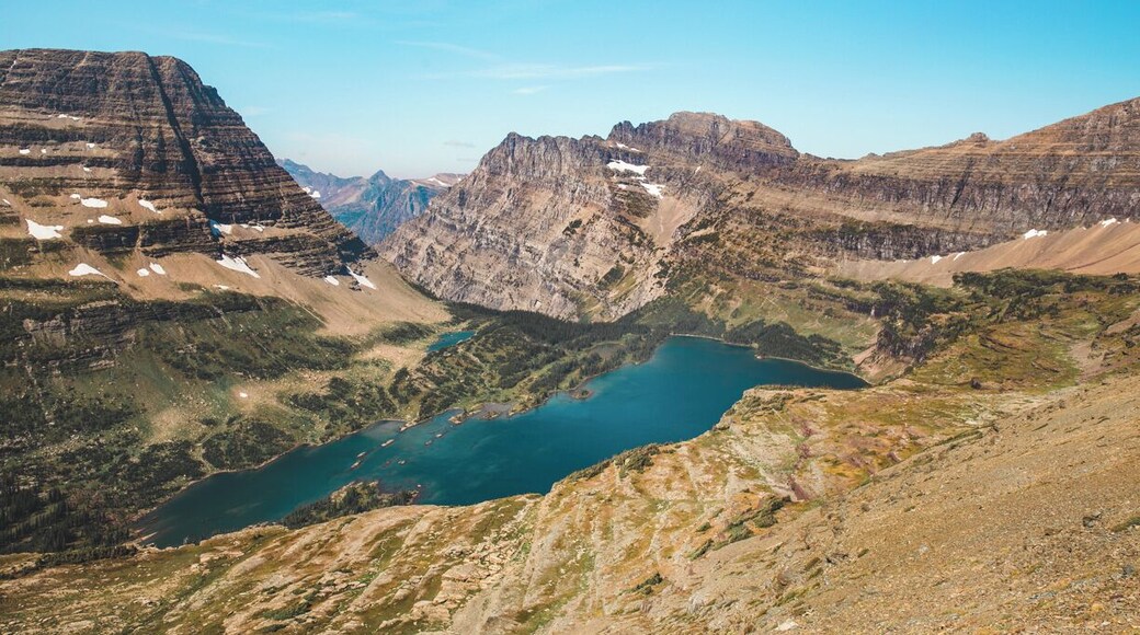 The hike u Mt. Reynolds at Glacier National Park does not disappoint. The 360 degree views are spectacular. We always find that the best places take a while to get to, but they are so worth it. #Adventure