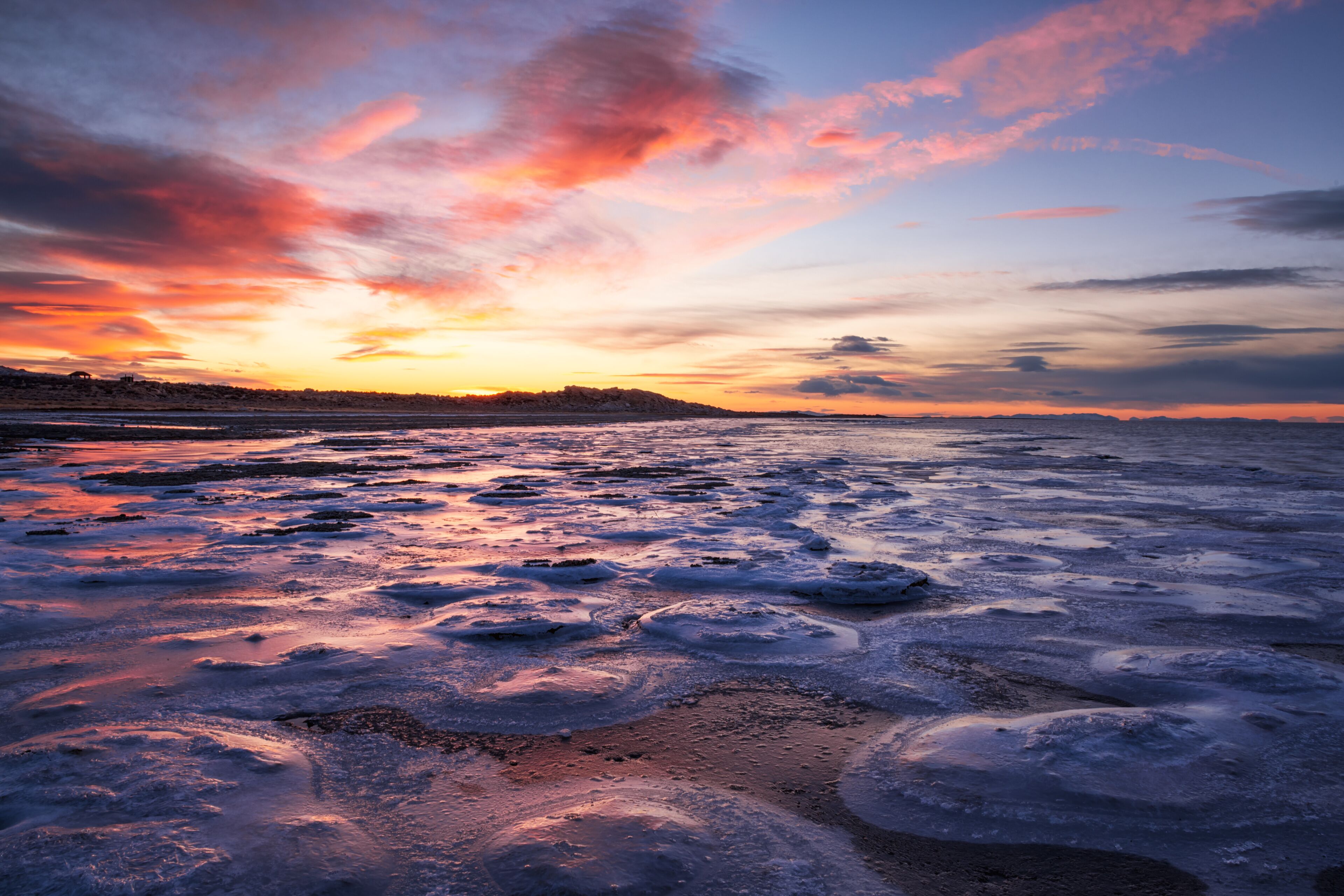 Evening Light Reflecting on the Frozen Great Salt Lake and Antelope Island