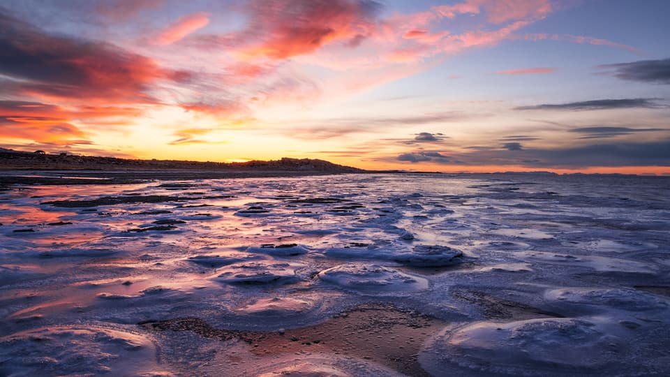 Evening Light Reflecting on the Frozen Great Salt Lake and Antelope Island