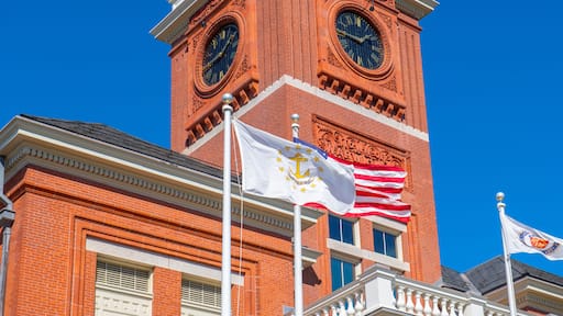 Flag of Rhode Island State in front of Warwick City Hall at 3275 Post Road in village of Apponaug, city of Warwick, Rhode Island RI, USA.