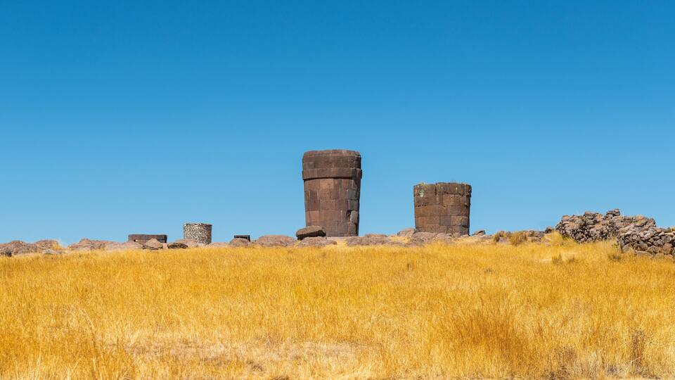 Landscape of Inca grave towers in Sillustani in the Titicaca Lake region nearby Puno city, Peru.