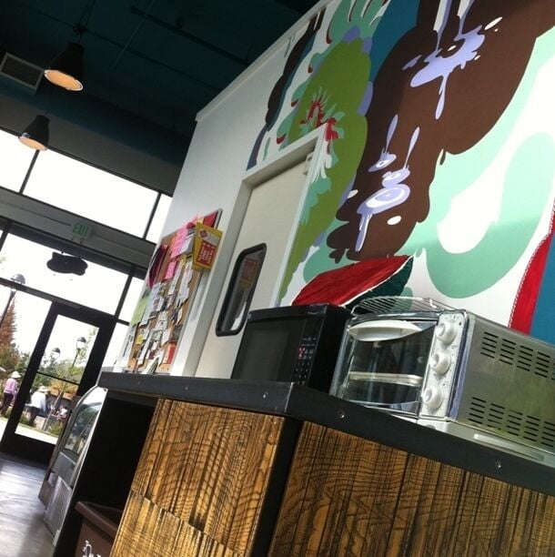 Great coffee shop in the middle of a new developed community in White center. Love the hip artsy style: modern eclectic with a play area for kids. Local artists featured and I believe they are trying to hook up some live music nights. Casual, delay in making your coffee is a nice break from the "Starbucks style". 