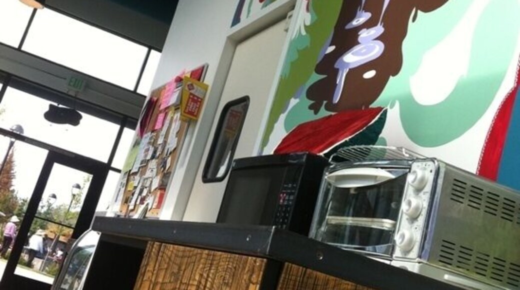 Great coffee shop in the middle of a new developed community in White center. Love the hip artsy style: modern eclectic with a play area for kids. Local artists featured and I believe they are trying to hook up some live music nights. Casual, delay in making your coffee is a nice break from the "Starbucks style".