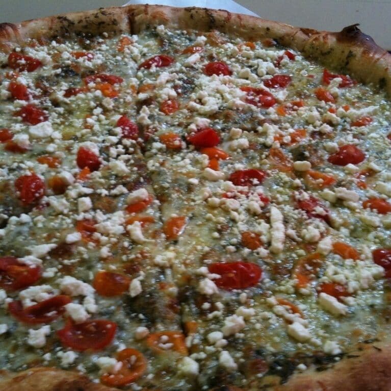 Cherry tomatoes, feta & mozzarella on a pesto base...I wish it wasn't a special because it was delicious! My favorite pizza place, for the food, the service and the kids' area. Love it!