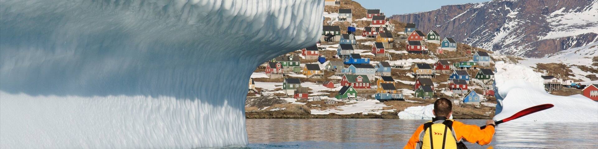 Upernavik which includes mountains, snow and kayaking or canoeing