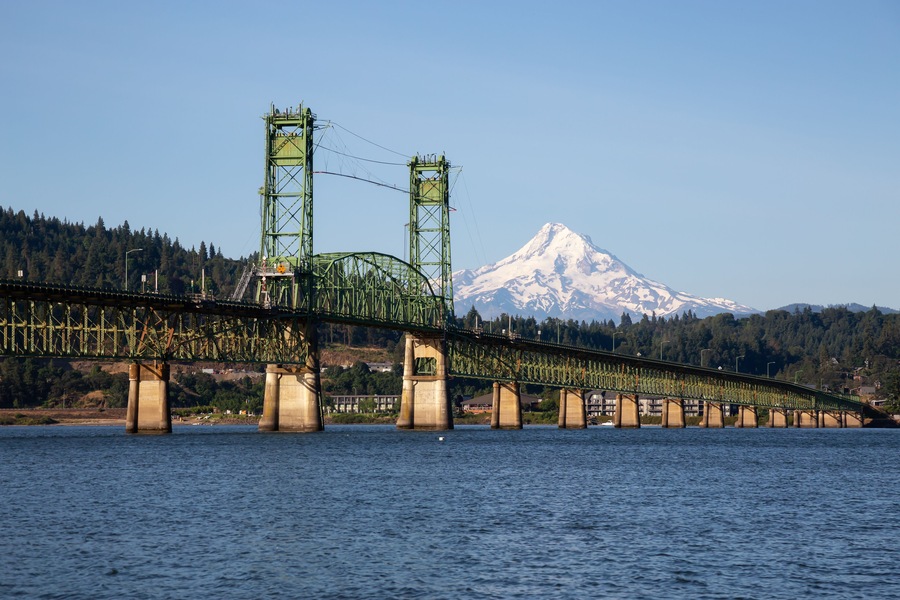 Beautiful View of Hood River Bridge going over Columbia River with Mt Hood in the background. Taken in White Salmon, Washington, USA.