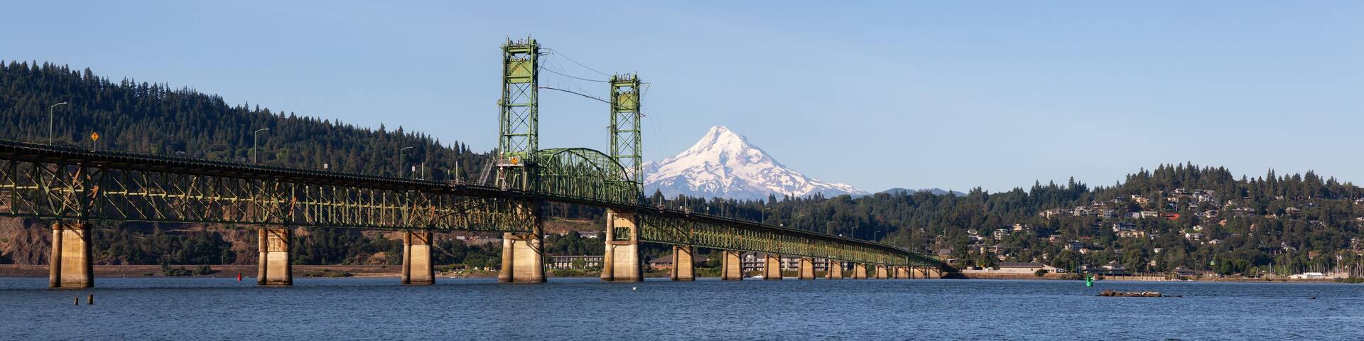 Beautiful Panoramic View of Hood River Bridge going over Columbia River with Mt Hood in the background. Taken in White Salmon, Washington, USA.