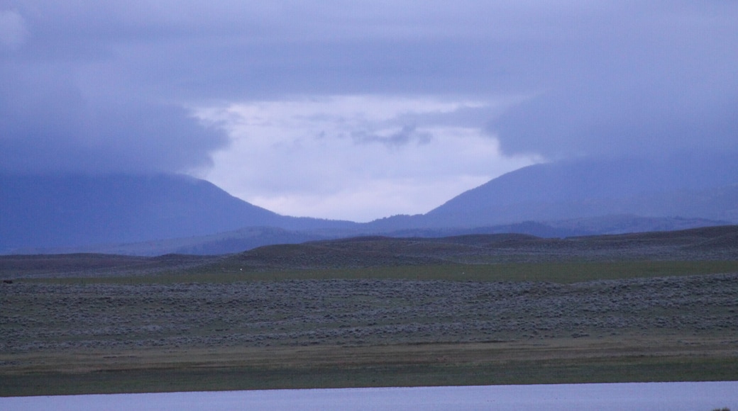 Don't remember the exact location this photo was taken. South of Lewis and Clark National Forest. Anyway, we just thought it was interesting, the gap in the clouds over the gap in the mountains