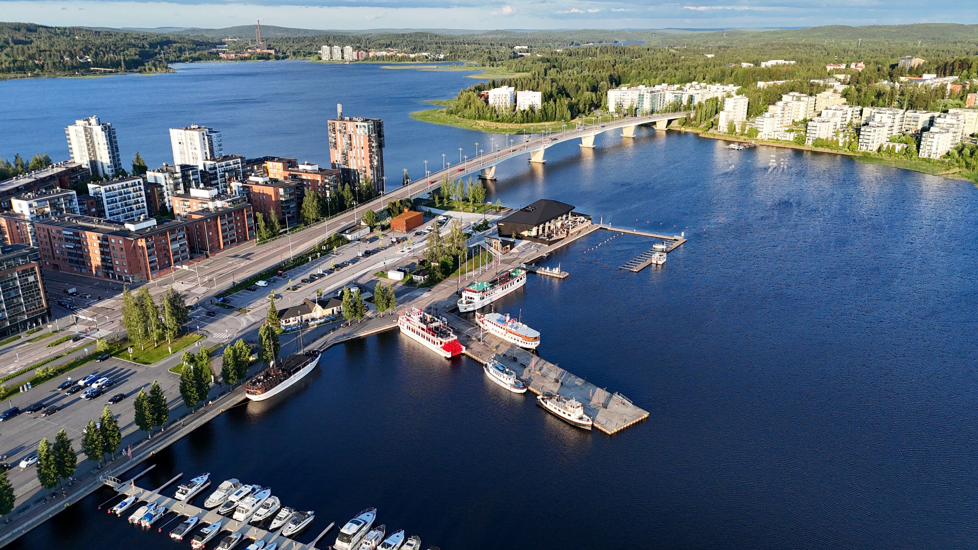 Golden Hour Drone View of Kuokkalan Silta and Jyväskylä Harbor in Summer Evening