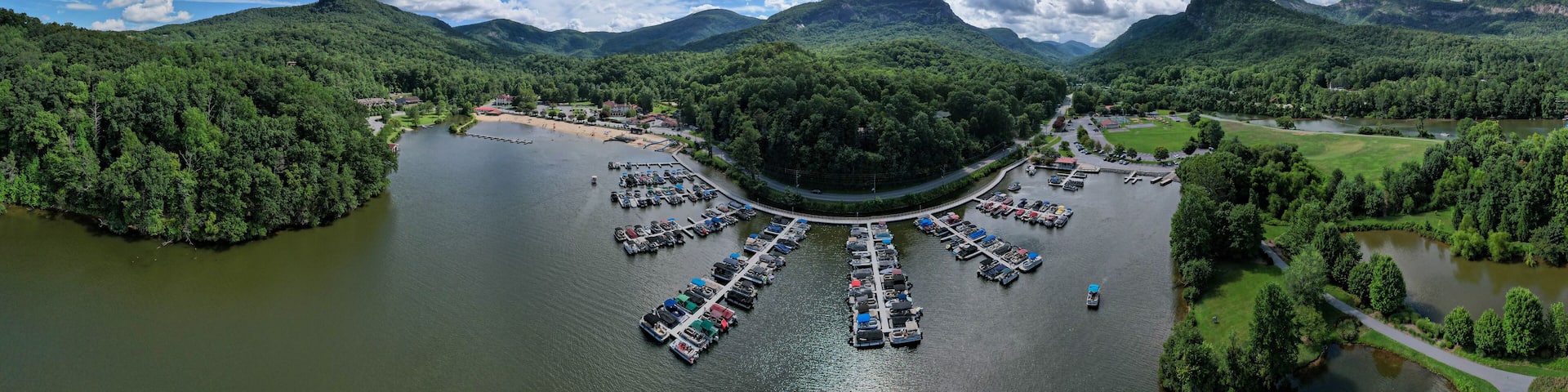 Boats docked and puffy clouds in North Carolina