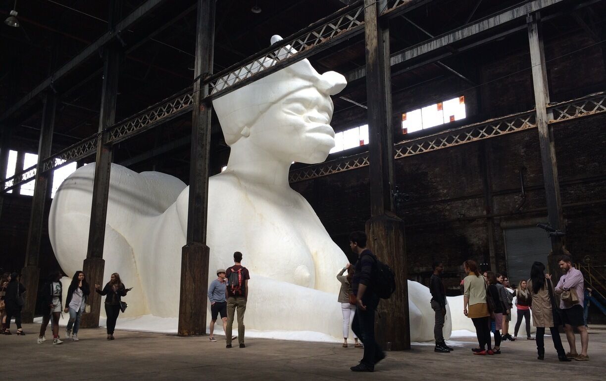 Kara Walker's 35ft sphinx-like sculpture made of 4 tons of sugar.  

http://mobile.nytimes.com/2014/05/12/arts/design/a-subtlety-or-the-marvelous-sugar-baby-at-the-domino-plant.html?_r=0&referrer=