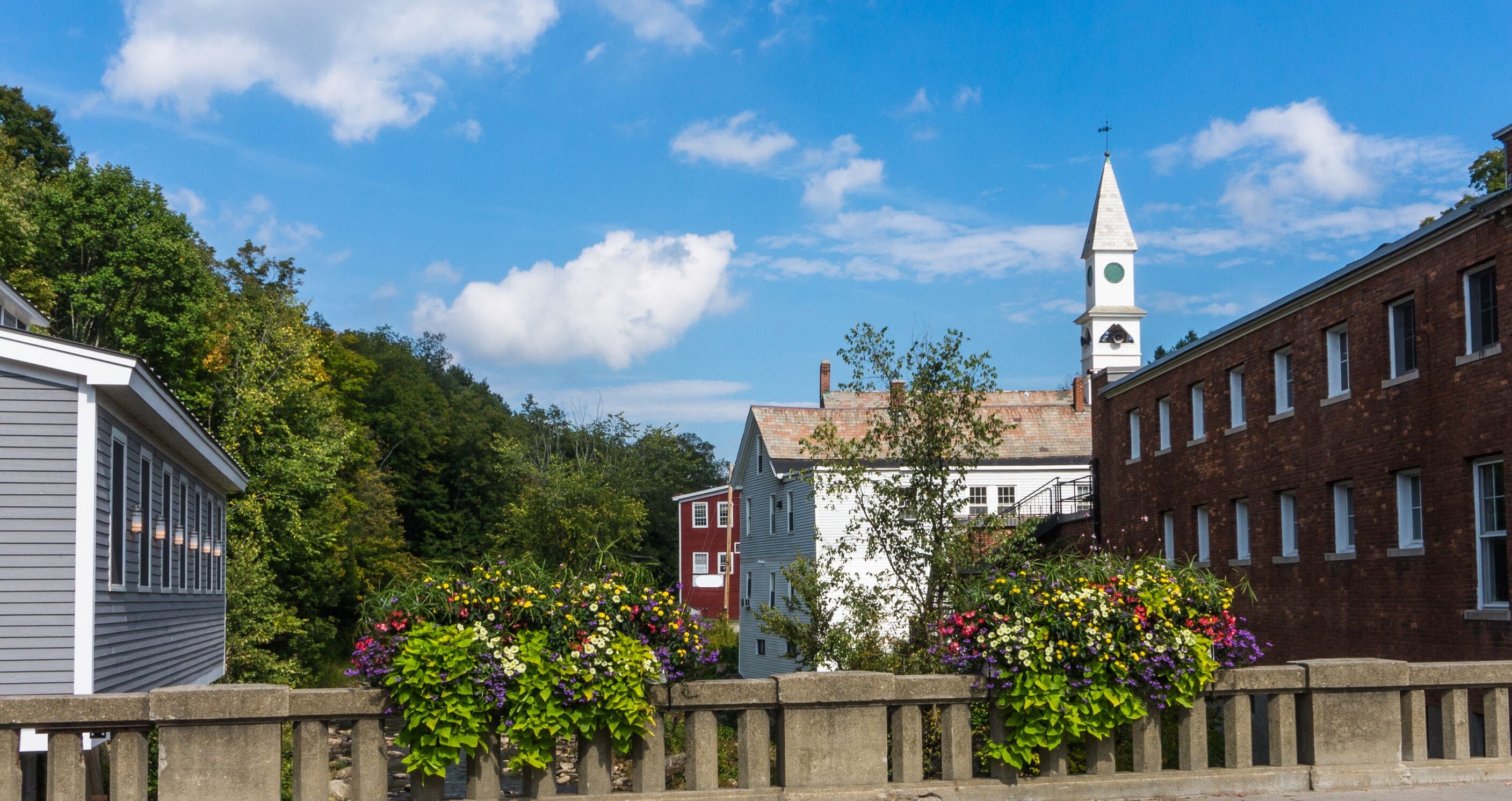 bridge with lovely flower arrangements in old New England town 
