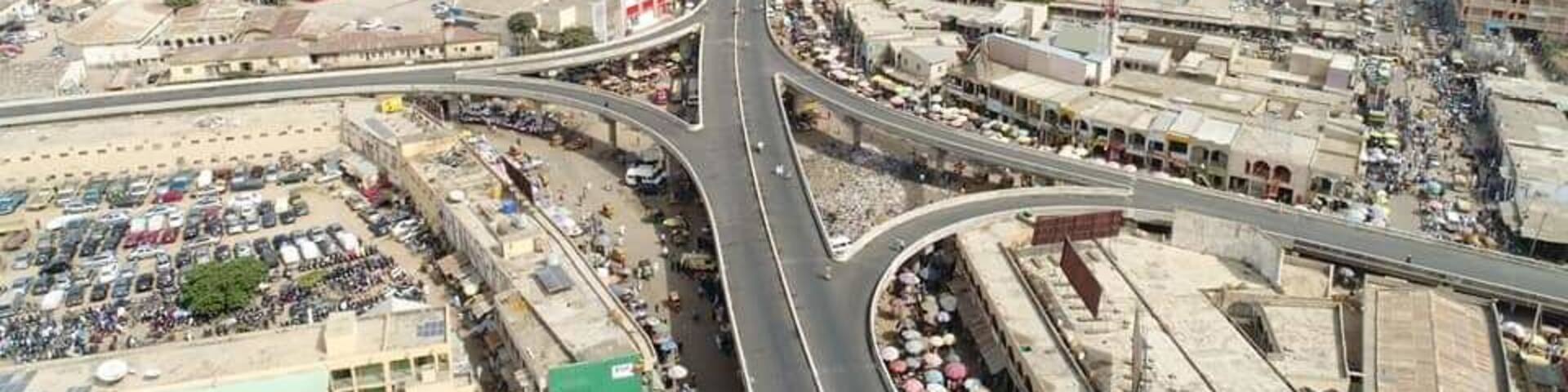 Chief Olusegun Obasanjo Flyover is the longest flyover in West Africa and one of the longest if not the longest in Africa as a whole.
The fly-over located at the Central Business Area of Sabon Gari, Kano - an urban setting that has mostly non-indigenes as its habitat is pretty a fantastic destination for mild adventure. A place located in Northern Nigeria and populated mostly by the Muslims.
The said flyover has different route that provide assessable road channels that does not just make road links possible but lessen road congestion and foster quick arrival to one's destination.
The hustling and bustling nature of the scene, the varieties of goods and food items sold, the manner, language (Hausa) and way of life of the people, the common and most consumed diet, are all worth the experience.
#Culture.