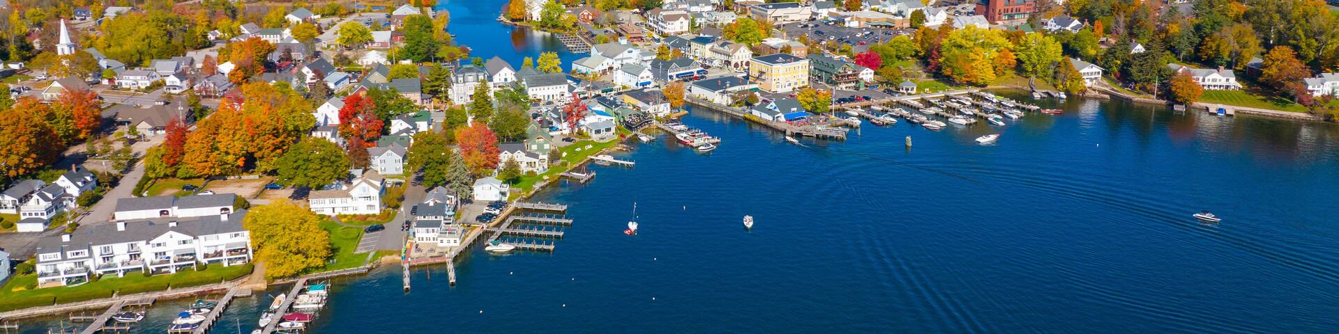 Wolfeboro historic town center at Lake Winnipesaukee aerial view in fall on Main Street, town of Wolfeboro, New Hampshire NH, USA.