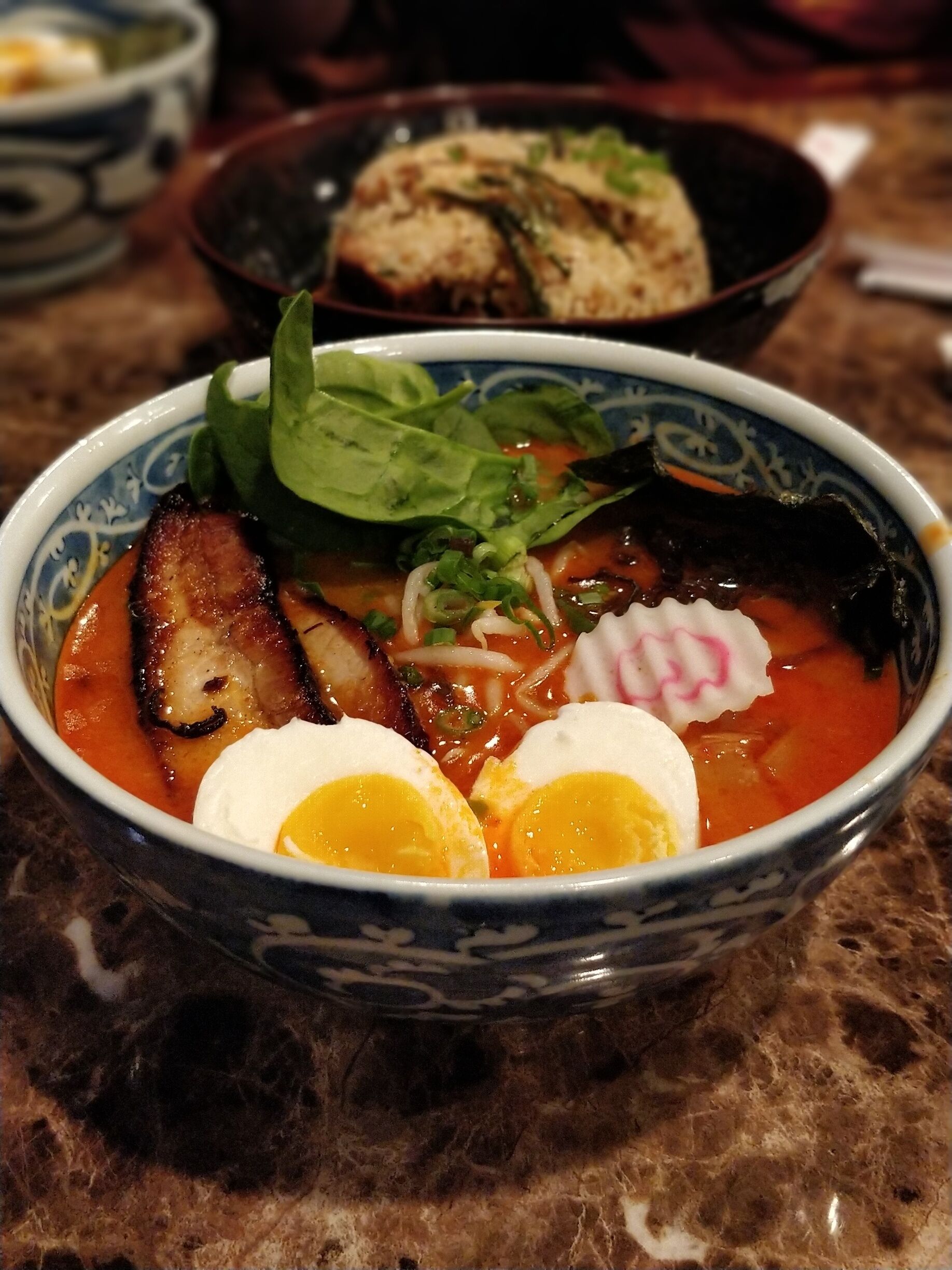 Good ramen place in an unlikely location. Had the spicy ramen and garlic pork fried rice.  The ramen wasn't spicy but the flavor was good and the broth was smooth and creamy in texture.  Lots of pork in the fried rice. 