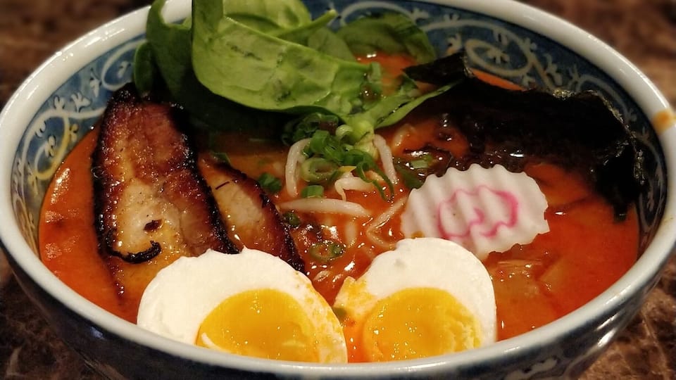 Good ramen place in an unlikely location. Had the spicy ramen and garlic pork fried rice. The ramen wasn't spicy but the flavor was good and the broth was smooth and creamy in texture. Lots of pork in the fried rice.