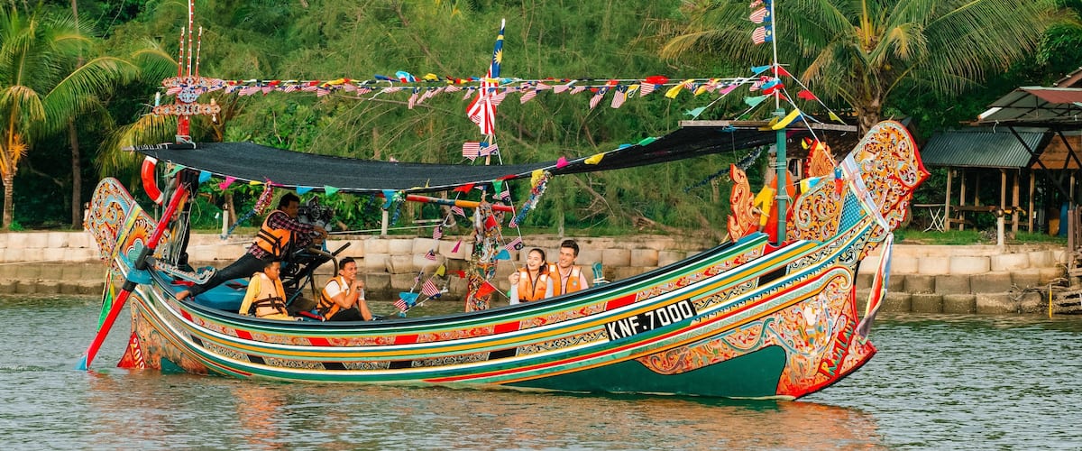 Kota Bharu which includes sailing as well as a small group of people