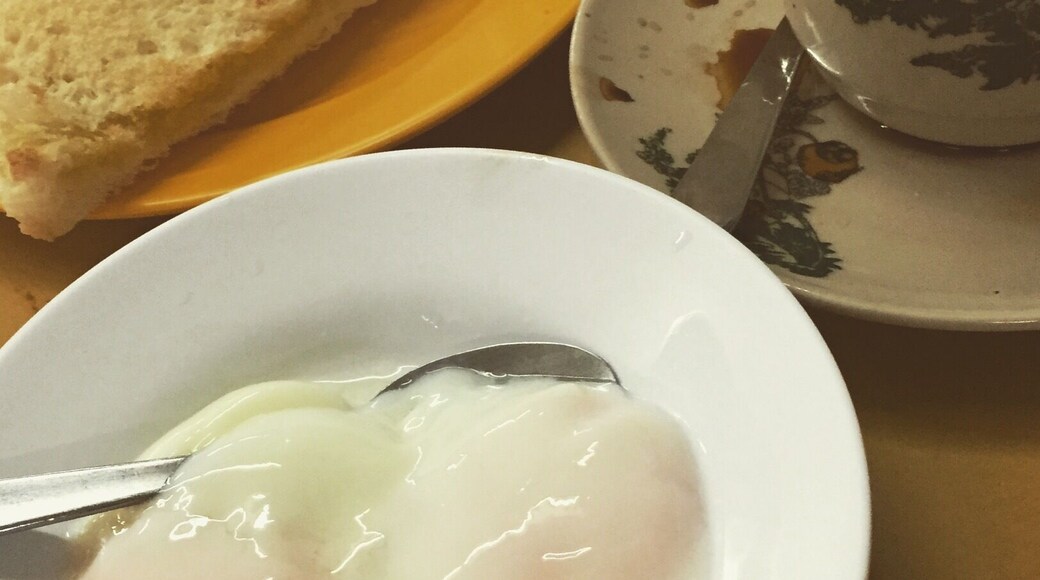 Crispy toast and nicely done eggs with local coffee. Please remind them to separate the sugar unless you like your coffee real sweet. This local cafe is just across the road from Tune Hotel KB