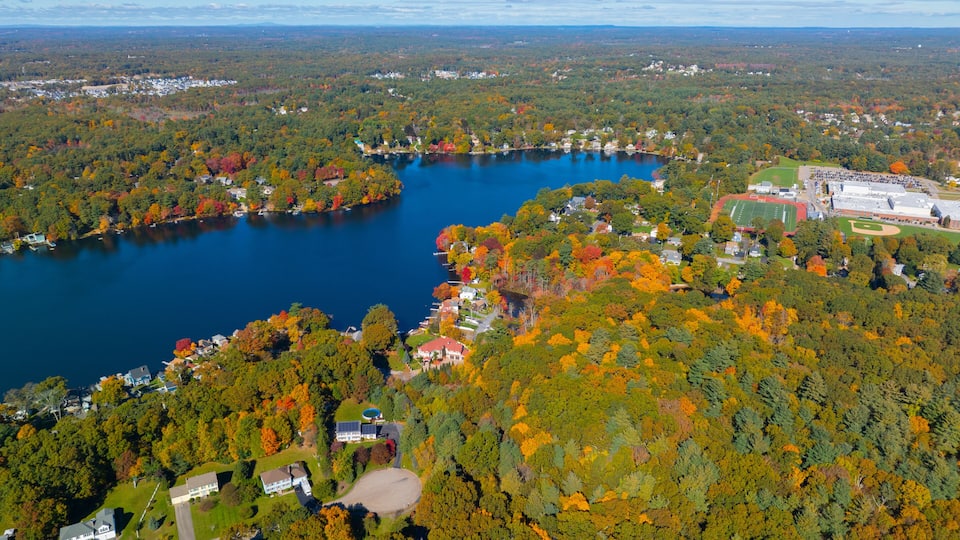 Lake Archer and Lake Pearl aerial view in fall near the historic town center of Wrentham, Massachusetts MA, USA.