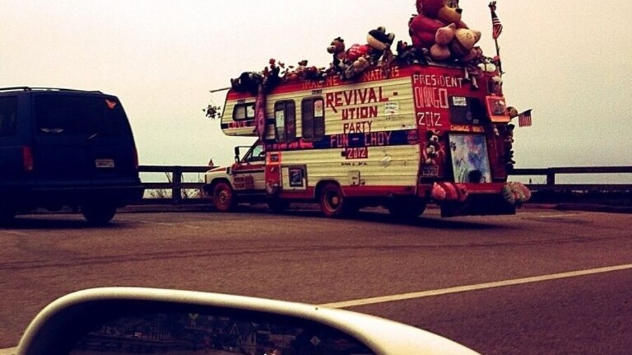 Two awesome things to point out in this photo: the crazy camper in front with all the stuffed animals and things on it, and the Lamborghini behind me.