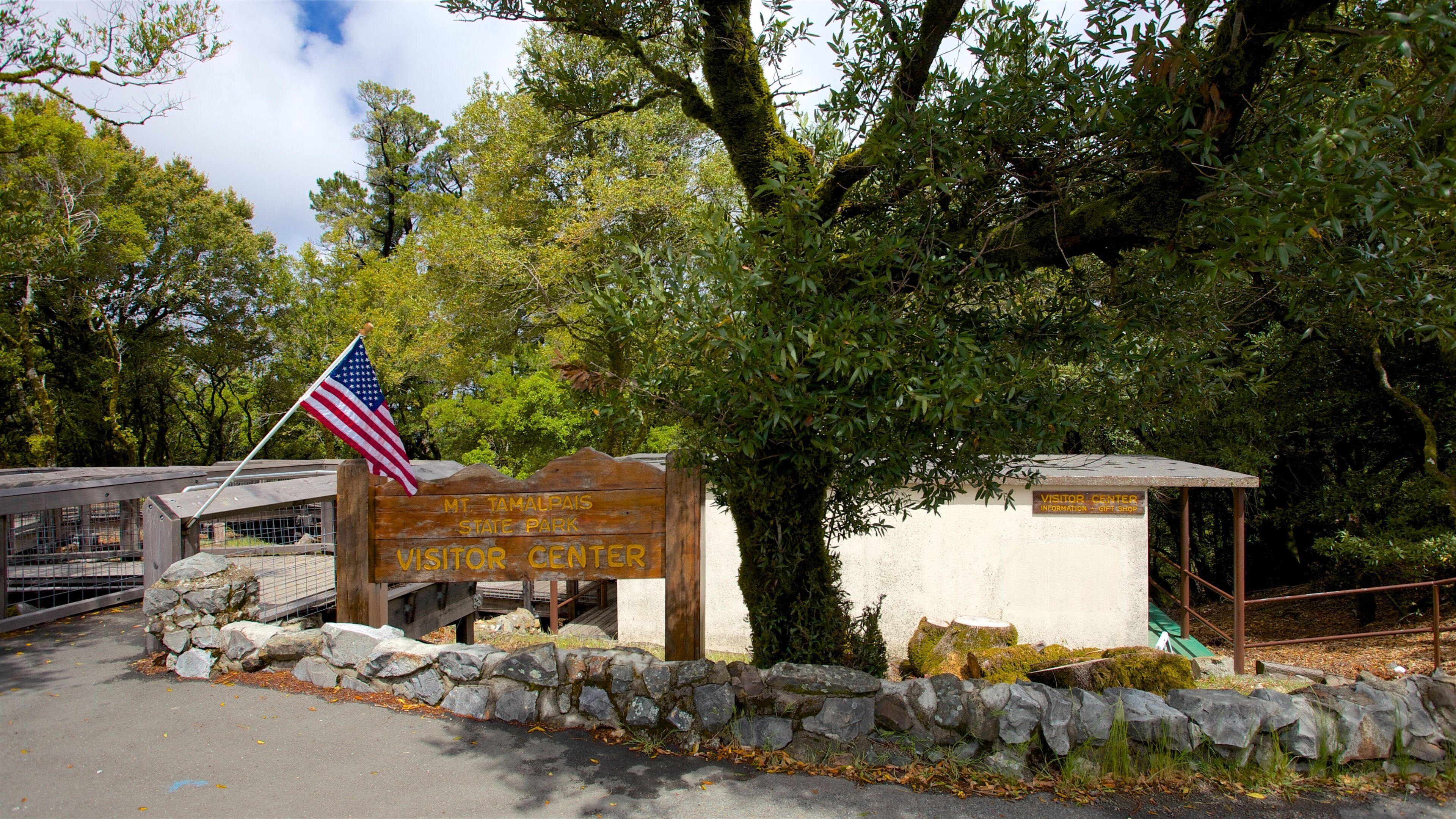 Muir Beach featuring a park and signage