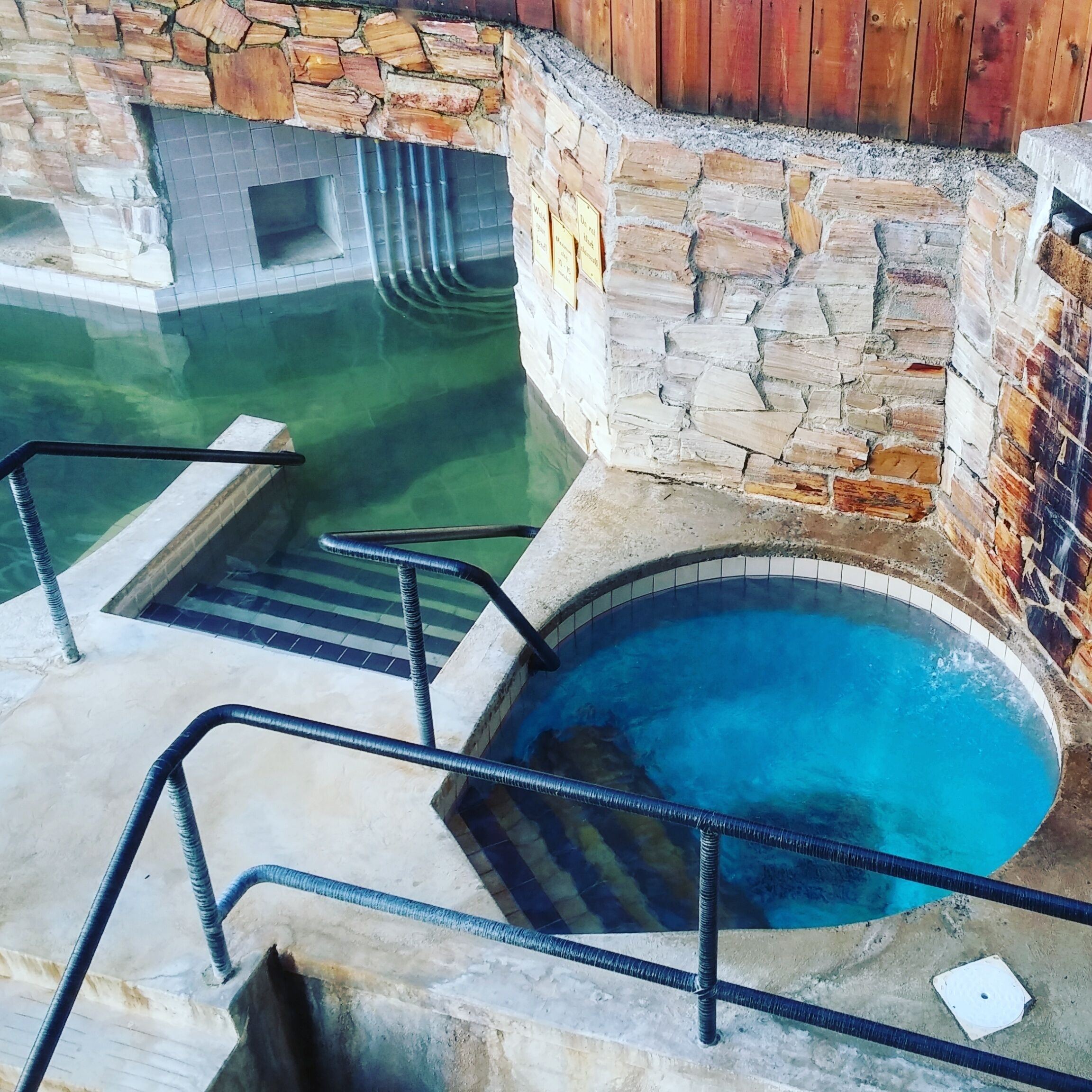 The left is the entrance to the caves and to the right is the uber cold dunk tank.

Ainsworth Hot Springs resort is the second highest rated hot springs in British Columbia. It is also one of the rare hot springs in BC that contain natural lithium in the water. 

The hot caves will have you feeling relaxed like a marshmallow. 

As there isn't much in the area, there is an on-site restaurant with gourmet and regular good options at very reasonable prices.

The service at the hotel is excellent and the rooms are very clean and bright. Spending the extra money for a deluxe mountain view room is well  worth it. Waking up to a sunset or watching the moon rise over the mountains is just amazing. 

The hot caves fills itself up with new water 6 times a day while the pool fills up 4 times.

The best time to go is during the off season and on week days since weekends here can get nuts.

The hot springs is open to the public at a rate of $12 per person and opens at 10AM. From 8:30AM to 10AM is for hotel guests only.

If your staying as a guest there is no fee to use the springs as it's included in the cost of your room.