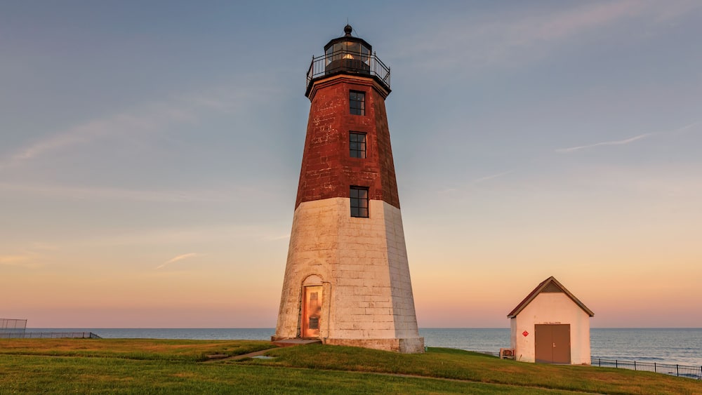 The Point Judith lighthouse at sunset near Narragansett, Rhode Island, USA.