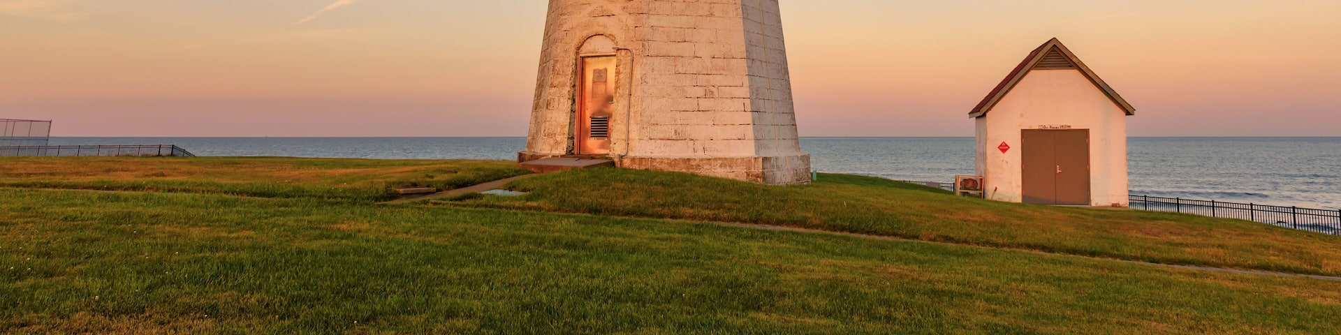 The Point Judith lighthouse at sunset near Narragansett, Rhode Island, USA.