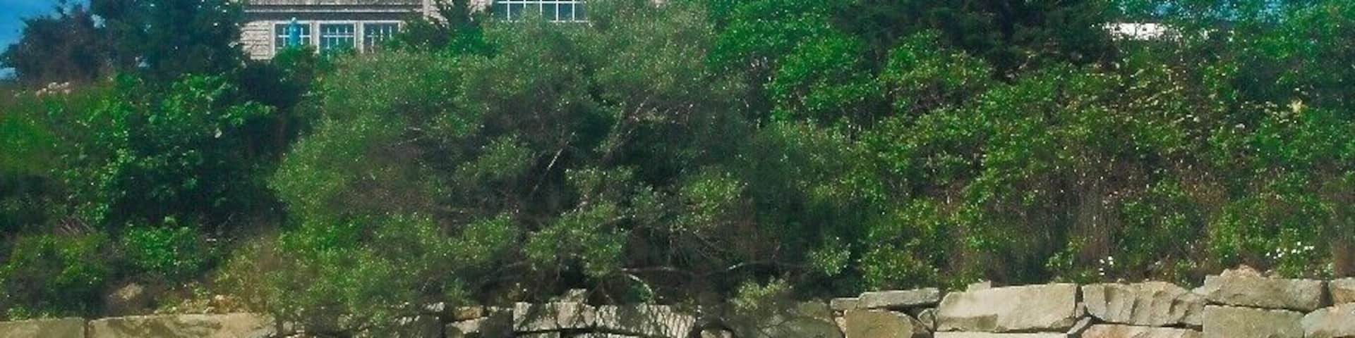 On Point Judith Pond, this is a private lighthouse built to be a functioning lighthouse by the owner but remains unlicensed.