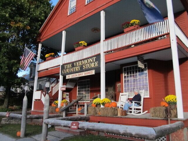 A red building with a porch, labeled "The Vermont Country Store."