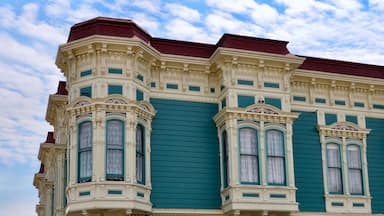 Closeup of traditional house in the city of Ferndale in Humboldt County, California, USA, famous for its Victorian architecture, a sunny day with blue sky and clouds in summer, space for text