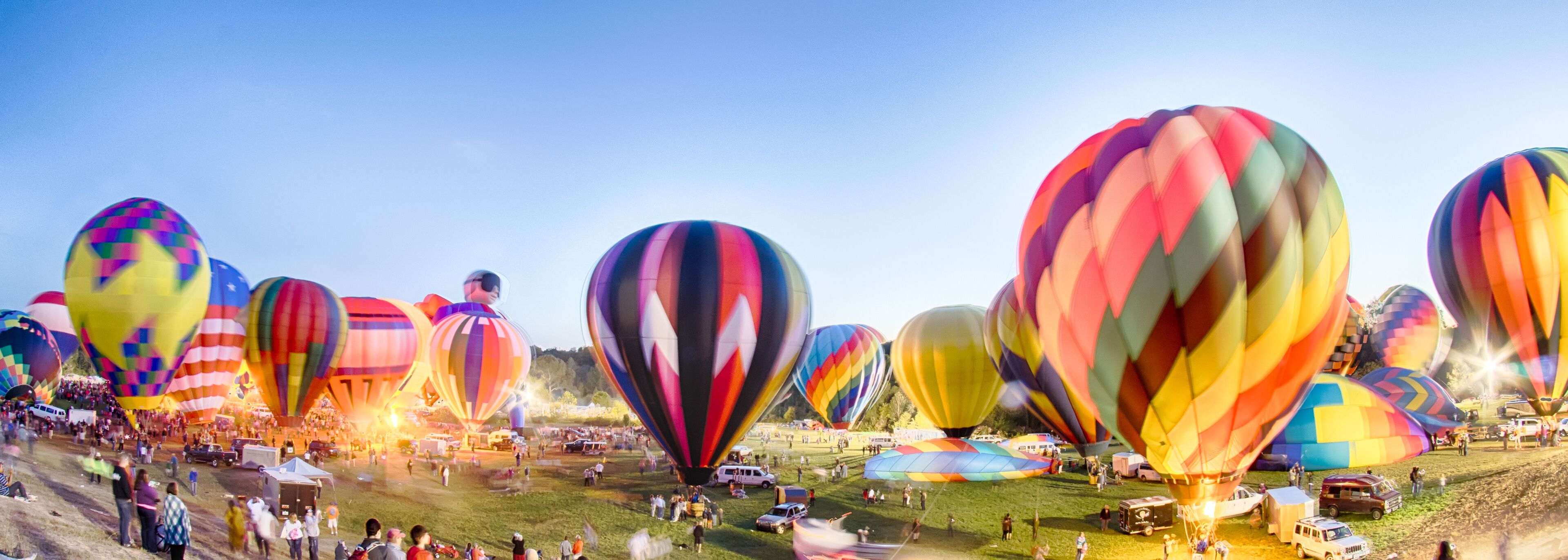 Bright Hot Air Balloons Glowing at Night